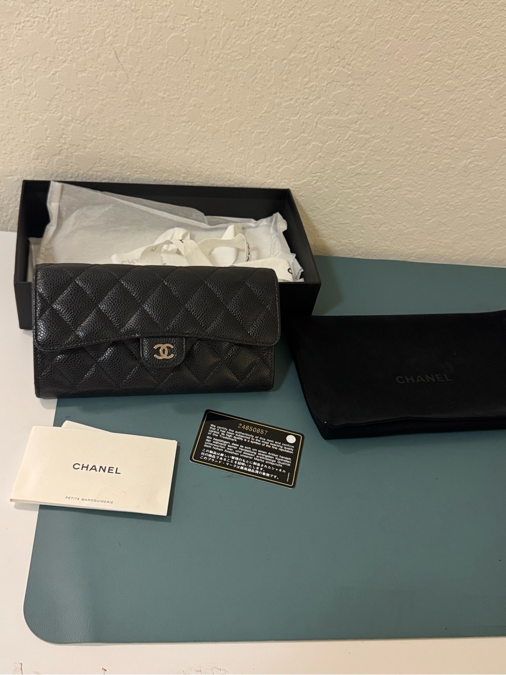 CHANEL Black Quilted Caviar Leather Wallet with Gold CC Lock